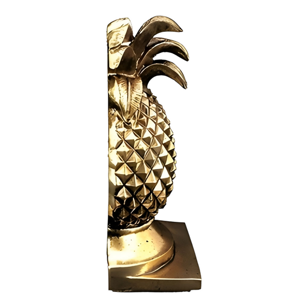 A set of antique gold pineapple shaped bookends with a textured diamond pattern and a square base. Palm Gifts