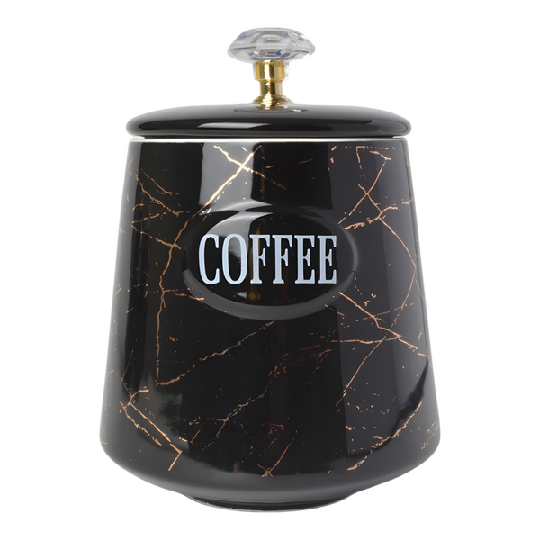 Set of three black ceramic canisters with gold marble design, each labelled for different contents: coffee, sugar, and tea. PALM GIFTS