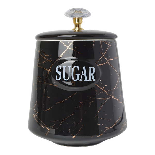 Set of three black ceramic canisters with gold marble design, each labelled for different contents: coffee, sugar, and tea. PALM GIFTS