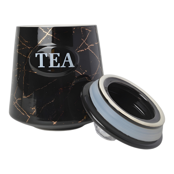 Set of three black ceramic canisters with gold marble design, each labelled for different contents: coffee, sugar, and tea. PALM GIFTS