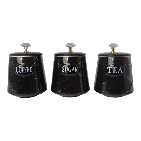 Set of three black ceramic canisters with gold marble design, each labelled for different contents: coffee, sugar, and tea. PALM GIFTS