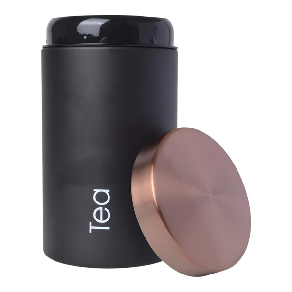 Set of three black metal kitchen canisters with rose gold lids, labelled sugar, tea, and coffee. PALM GIFTS
