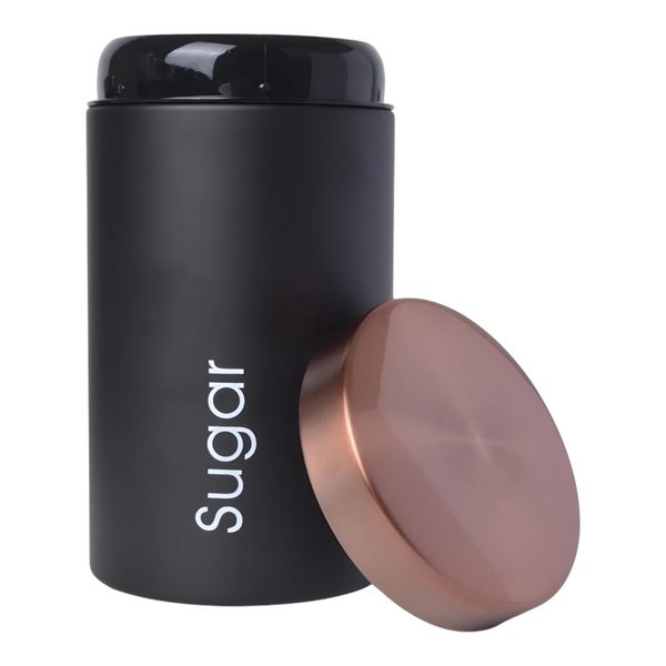Set of three black metal kitchen canisters with rose gold lids, labelled sugar, tea, and coffee. PALM GIFTS