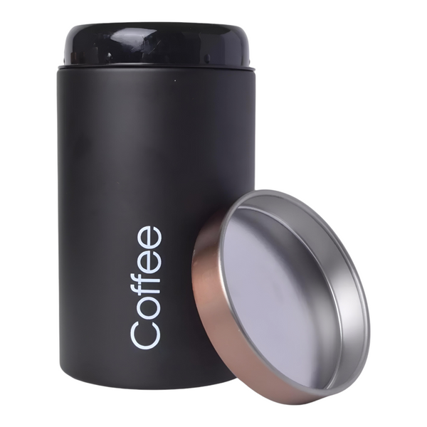 Set of three black metal kitchen canisters with rose gold lids, labelled sugar, tea, and coffee. PALM GIFTS