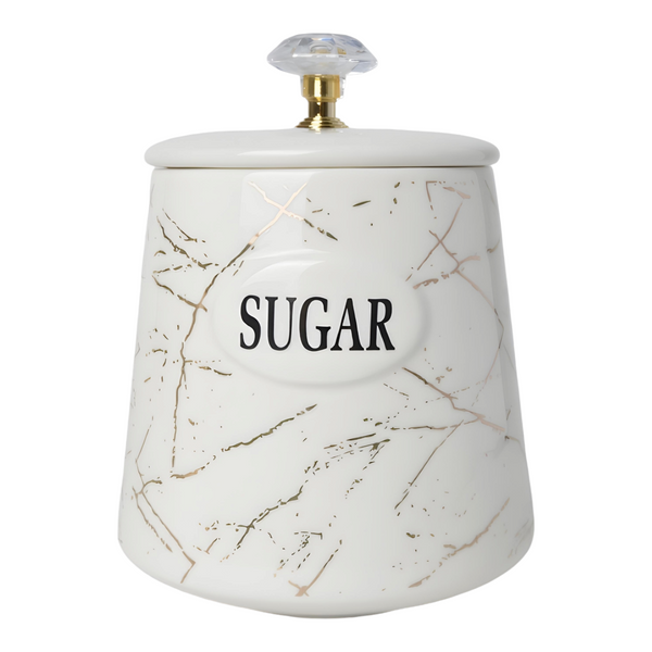 Three white ceramic kitchen canisters with gold marble design and gold handles, each labelled with different contents: coffee, sugar, and tea.