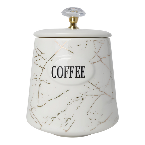 Three white ceramic kitchen canisters with gold marble design and gold handles, each labelled with different contents: coffee, sugar, and tea.