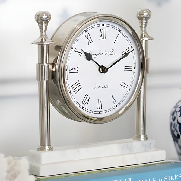 Silver Round Column Mantel Clock On White Marble Base
