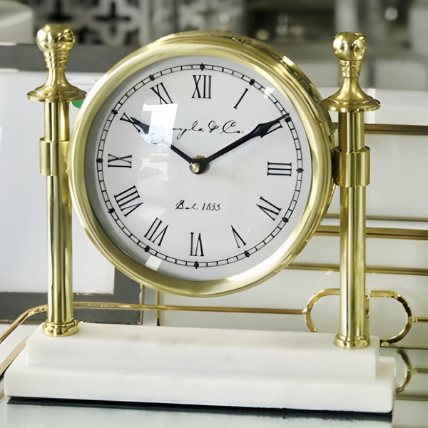 Gold Round Column Mantel Clock On White Marble Base